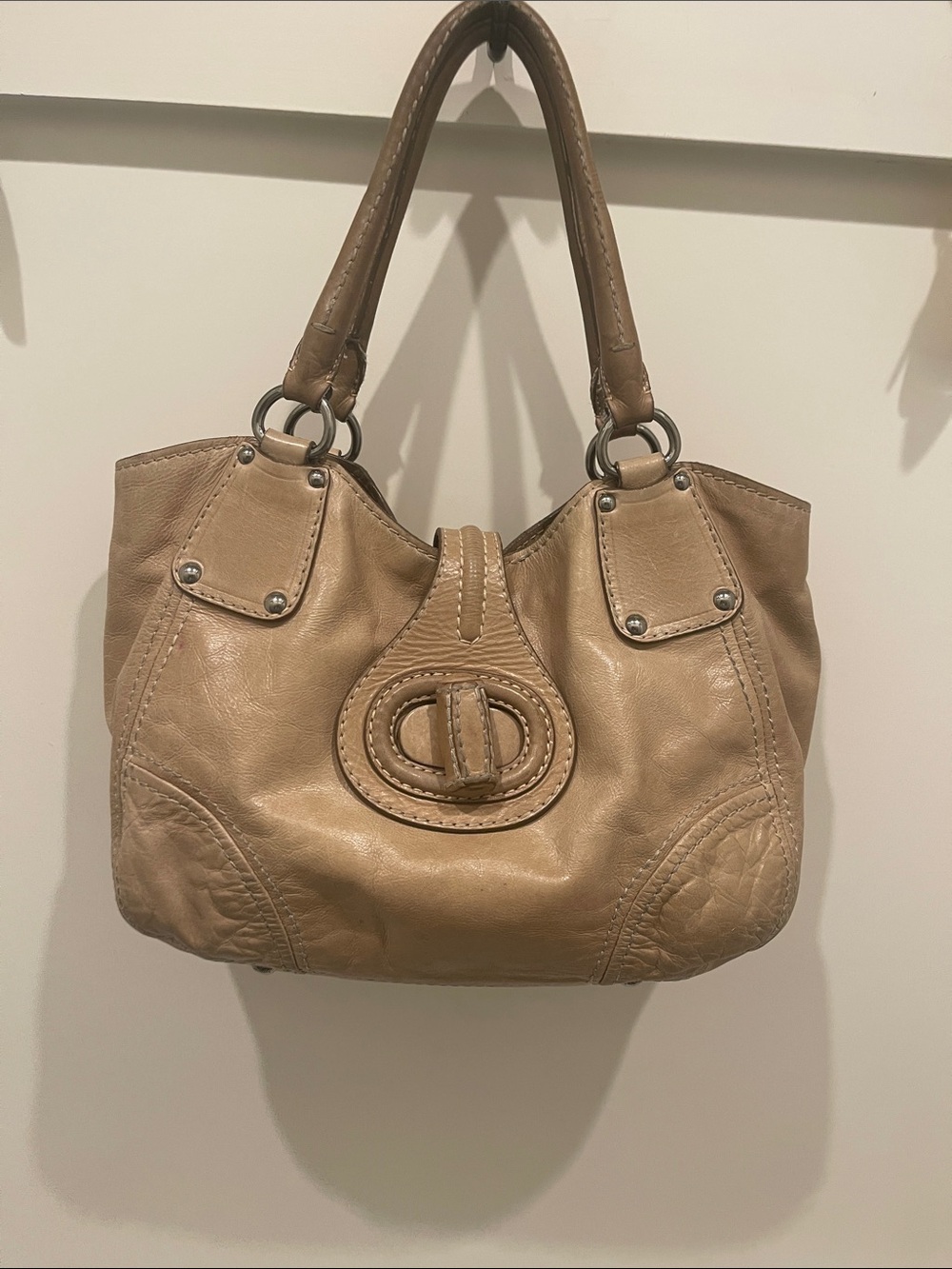 Beige Prada bag